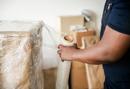 black-man-moving-furniture_53876-24835